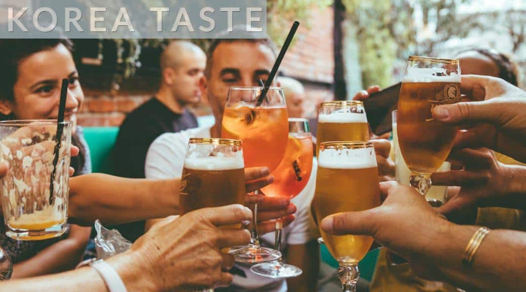 people holding drinks during day