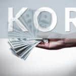 person holding 100 US Dollar banknote