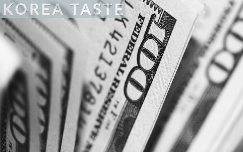 closeup photo of 100 US dollar banknotes